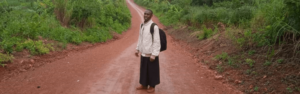 Tanzanian Catholic Priest Father Michael Daniel on his way to the outstations.