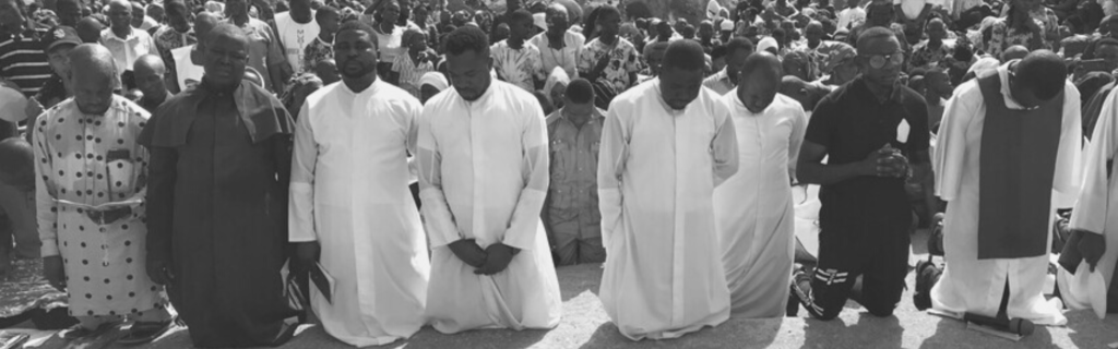 People praying in Nigeria