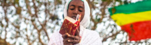 Ethiopia: A woman reads a passage from the Bible