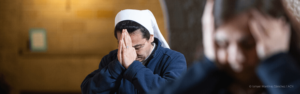 Sister praying